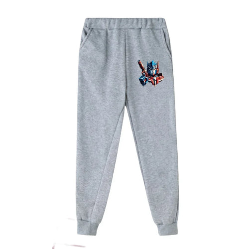 Pantalon de jogging gris avec impression colorée du personnage Optimus Prime sur la cuisse – Transformers.