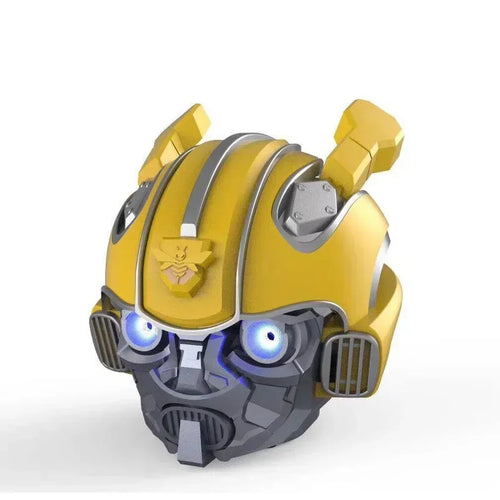 Casque décoratif Bumblebee jaune et gris aux yeux lumineux style robot sur fond blanc – Transformers.