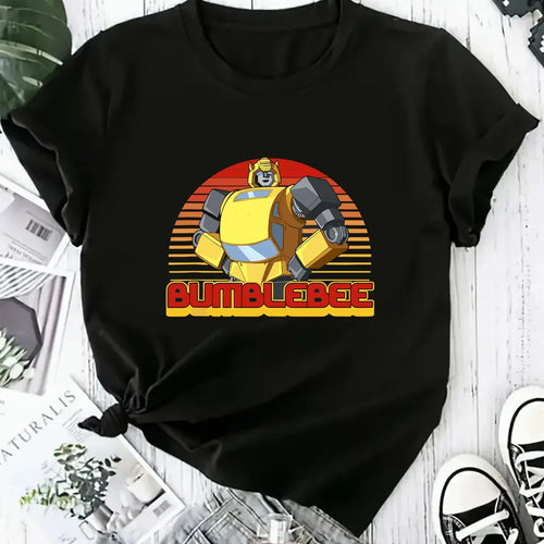 T-shirt noir avec dessin Bumblebee jaune, style rétro, fond rayé orange et rouge – Transformers.